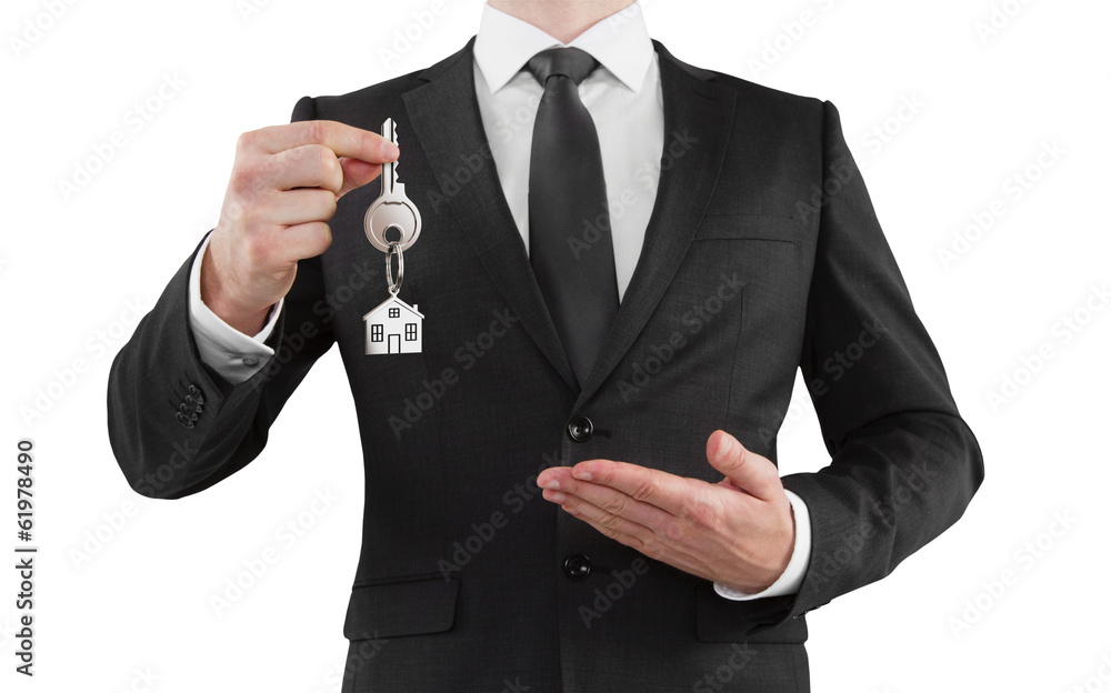 Wall mural businessman giving a key