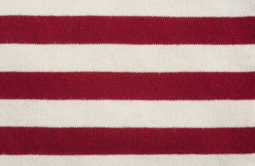 Red and white striped fabric texture