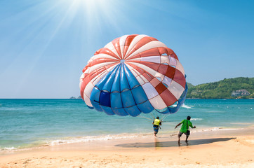Parasailing at Patong Beach in Phuket - Thailand extreme Sports - obrazy, fototapety, plakaty