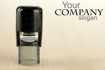 Stamp on wooden background