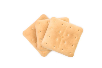 Saltine soda cracker isolated on white.