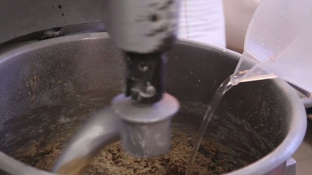 Close footage of dough machine in action