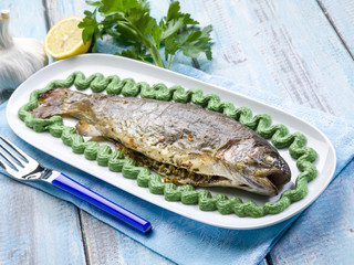 trout with spinach cream decoration