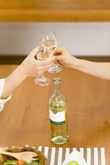 husband and wife having a toast