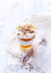 Yogurt with Peach Jam, Walnuts and Rye Flakes