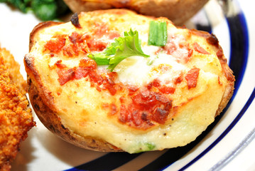 Twice Baked Potato with Cheese, Bacon Crumbs and Herbs