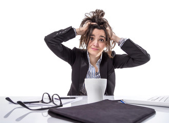 Stressed business woman pulling her hair