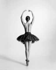 Black and white trace of a topless ballet dancer - obrazy, fototapety, plakaty