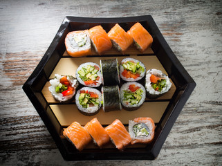 Sushi roll made dish. Sushi assorti.