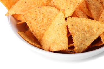 tasty potato chips in bowl isolated on white