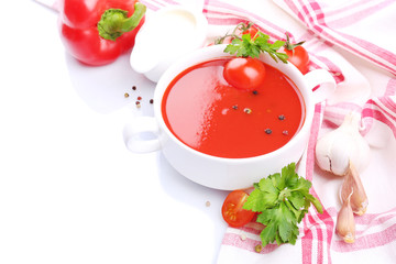 Tasty tomato soup and vegetables, isolated on white