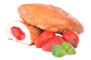 Fresh baked pasties with strawberries isolated on white