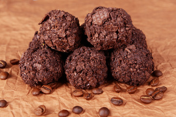 Delicious chocolates on table close-up