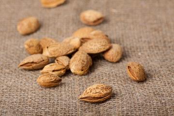 Almonds nuts on sackcloth