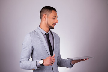 African American business man using a tactile tablet - Black peo
