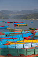 Fototapeta na wymiar Picturesque view at Pokhara lake with boats