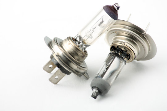 Vecchie lampade guaste per fari di autovettura