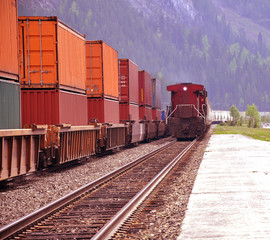 Two freight trains in Canadian rockies.