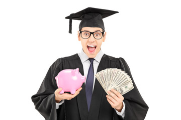 Male student holding money and a piggybank
