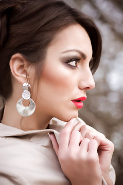 young woman with makeup and with jewelry precious decorations.