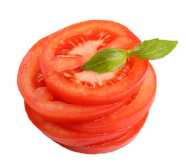 Slices of fresh tomato with basil, isolated on white