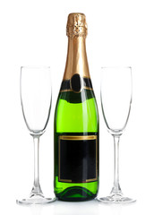 Bottle of champagne and empty glasses, isolated on white