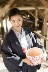 woman in yukata coming to hot spring