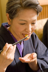 senior woman having meal