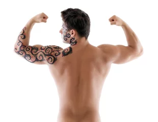 Fototapeten Image of muscular naked man posing back to camera © Wisky