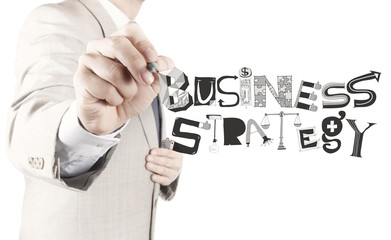 businessman hand drawing business strategy as concept
