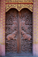 Wood carving temple door