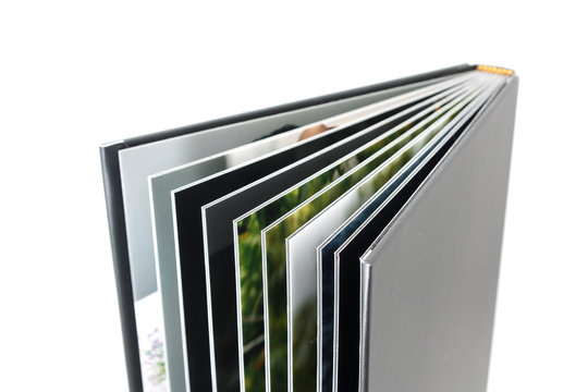 Black photo album isolated on white