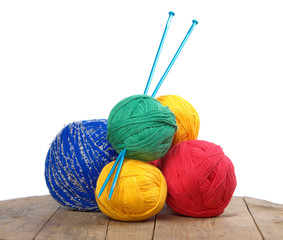 balls of colored yarn on the boards, knitting .