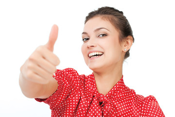 Attractive young business woman with thumb up