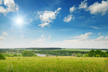 Beautiful sunset on spring field