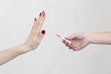 Woman refuses cigarette smoking