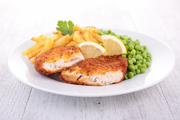 breaded meat and french fries