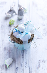 White Easter Eggs in a Nest