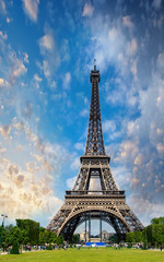 Sunset sky above Eiffel Tower - Paris. La Tour Eiffel from Champ