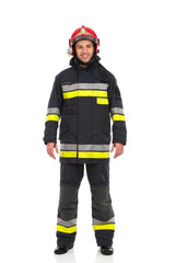 Fototapeta premium Firefighter posing, front view.