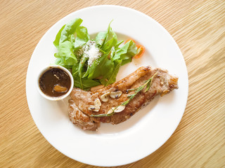beef steak on wooden table