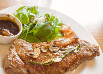 beef steak on wooden table