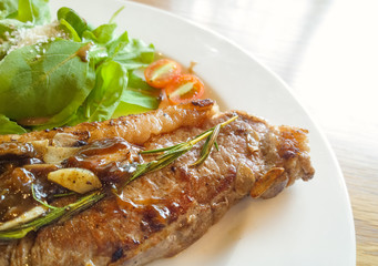beef steak on wooden table