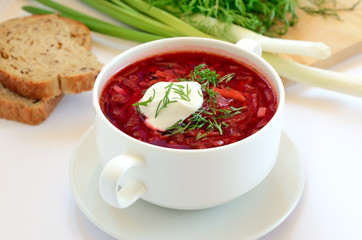 Red borscht soup with dill