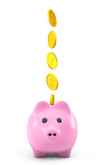 Golden dollars coins falling into a pink piggy bank