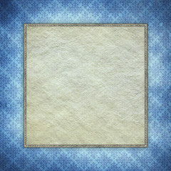 Blank paper sheet in picture frame on blue patterned background