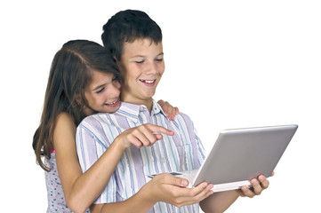 Fototapeta premium Girl & boy looking laptop