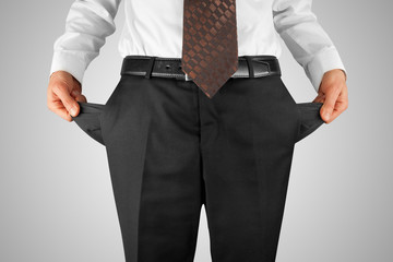 man showing empty pockets
