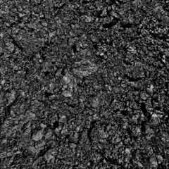 Black rock textured ground.