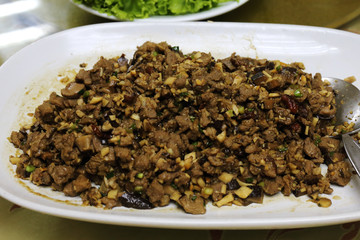 Stir fried pork chopping with mushroom